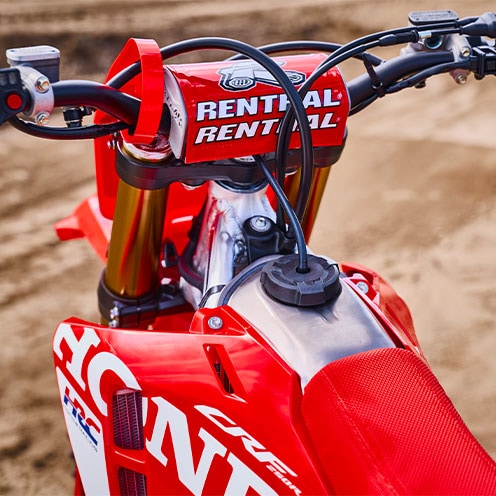 Triple clamps, axle, and steering stem detail
