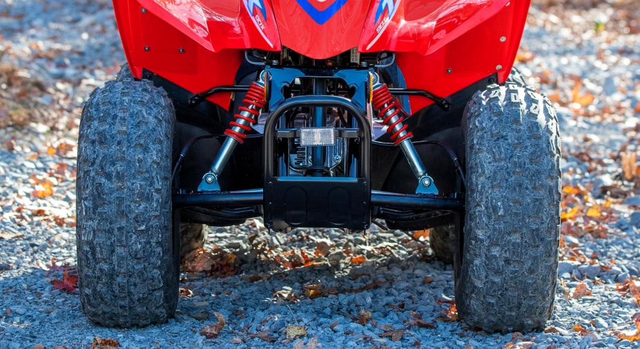 Bump-absorbing front suspension